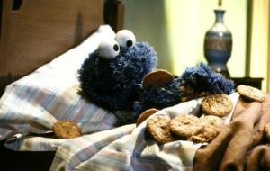 cookie monster in bed happiness